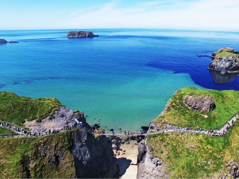 Carrick-a-Rede Rope Bridge County Antrim Northern Ireland Larne by Ballygally View Images blue sky Atlantic ocean irish sea